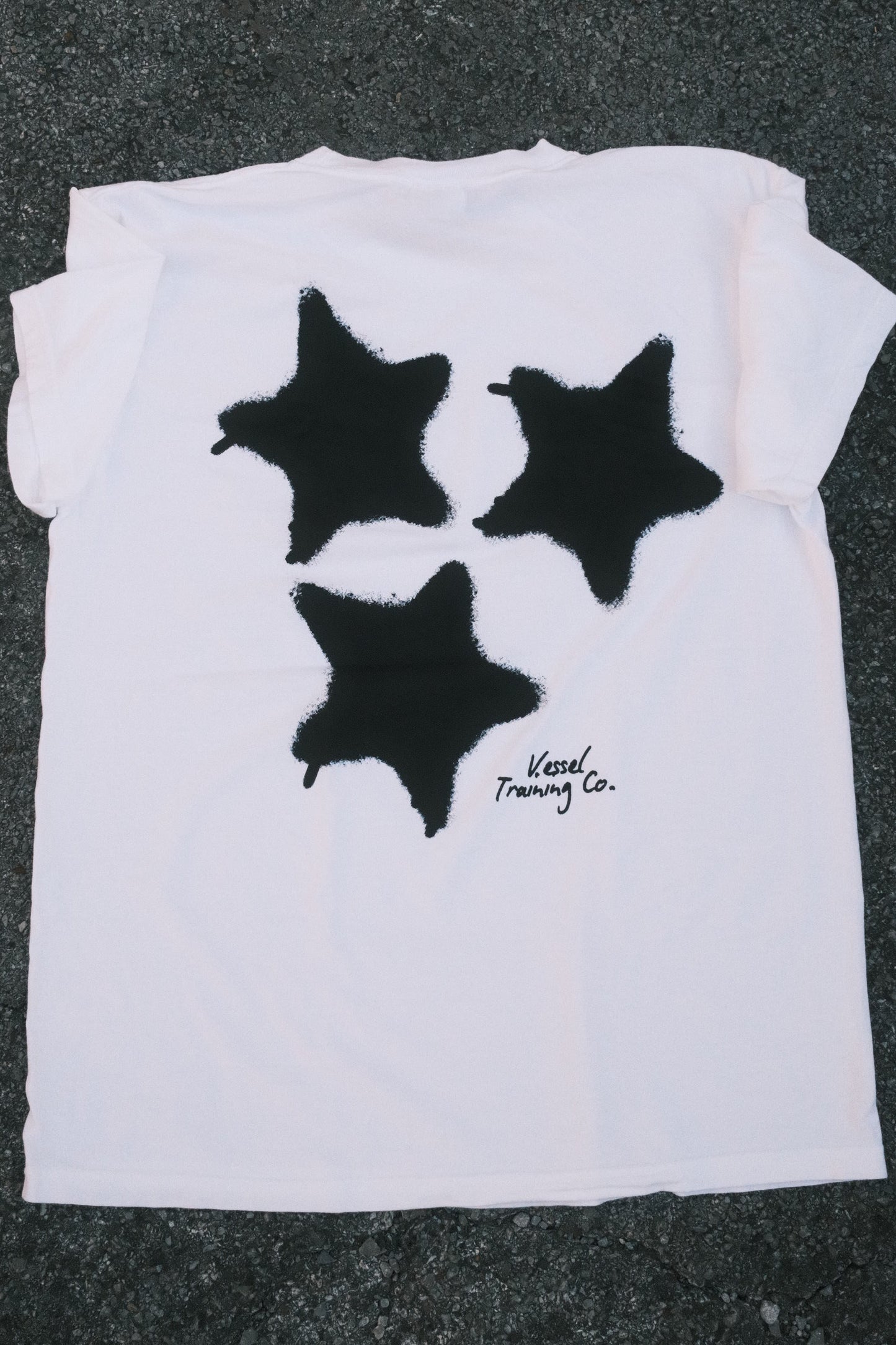 WHITE CREATE THE OUTCOME SHIRT